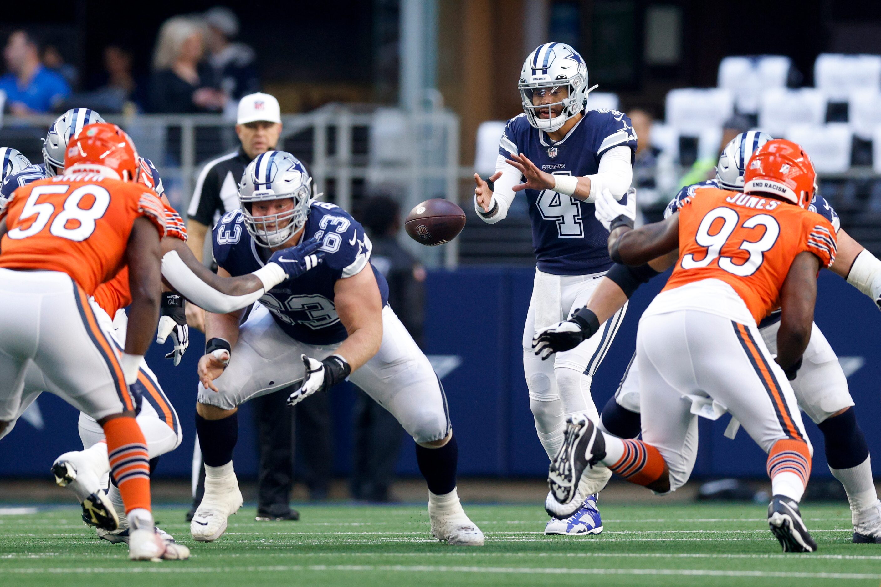 Dallas Cowboys quarterback Dak Prescott (4) takes the snap during the first half of an NFL...