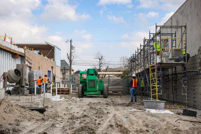 This area next to the existing building is being added to house a larger produce section and...