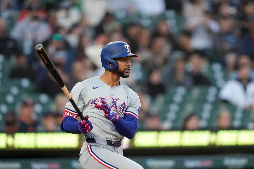 Texas Rangers' Leody Taveras singles during the fifth inning of a baseball game against the...