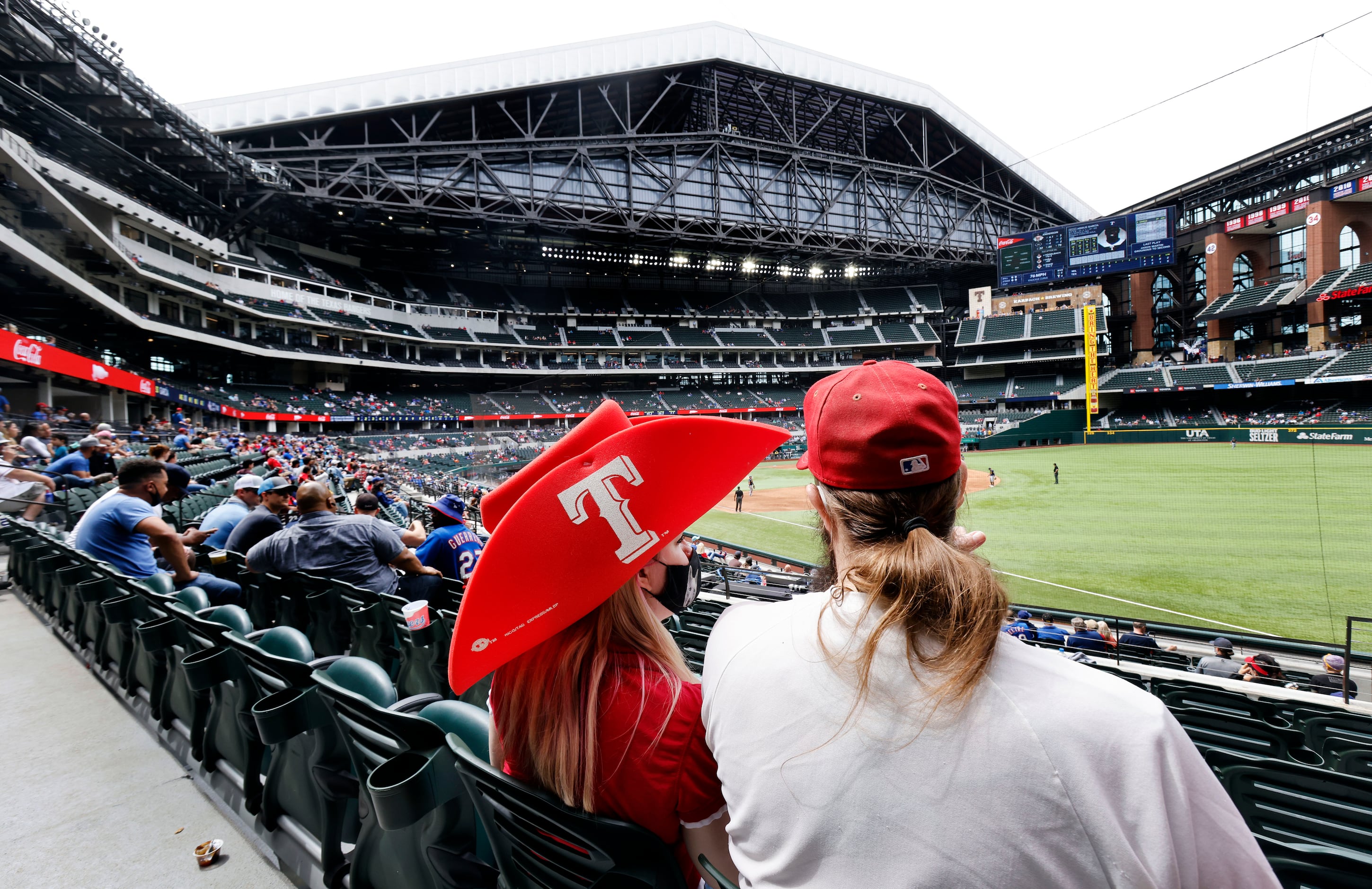 Texas Rangers fans take in an afternoon exhibition baseball game at Globe Life Field in...