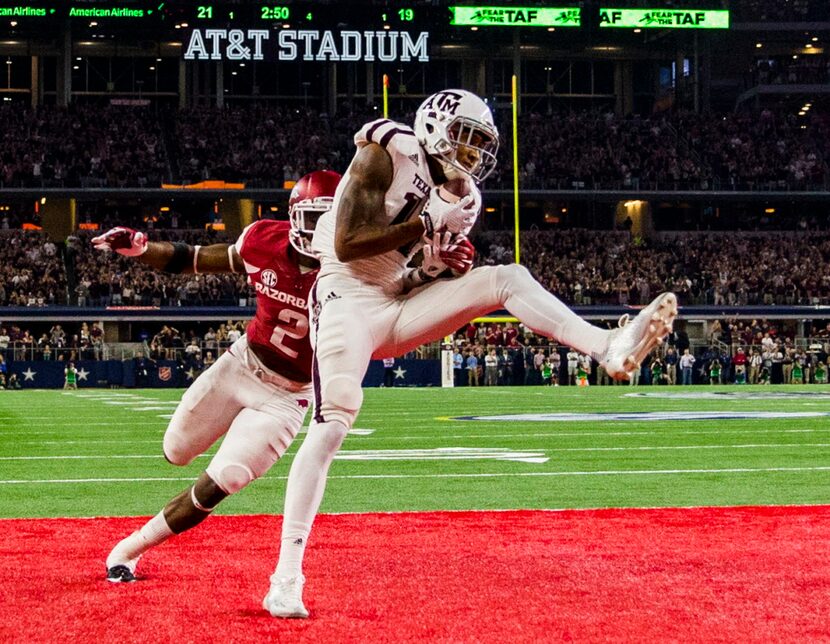 Texas A&M Aggies wide receiver Josh Reynolds (11) catches a pass in the end zone for a...