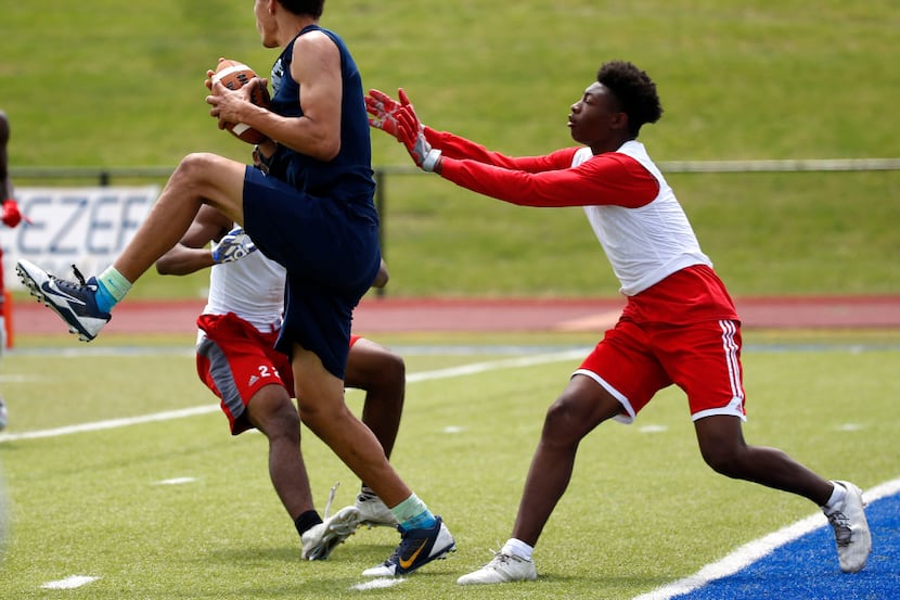 Fort Worth All Saints player Brendan Harmon (11, left) moves the ball against Bishop Dunne...