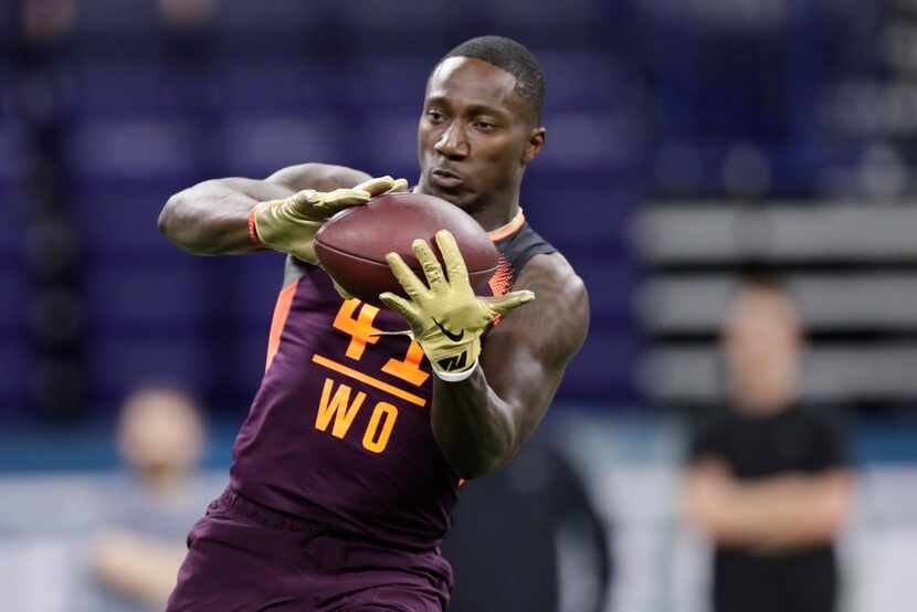 South Carolina wide receiver Deebo Samuel runs a drill at the NFL football scouting combine...