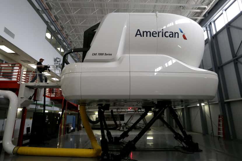 This photo made Friday, May 9, 2014 shows an American Airlines Boeing 787 flight simulator...
