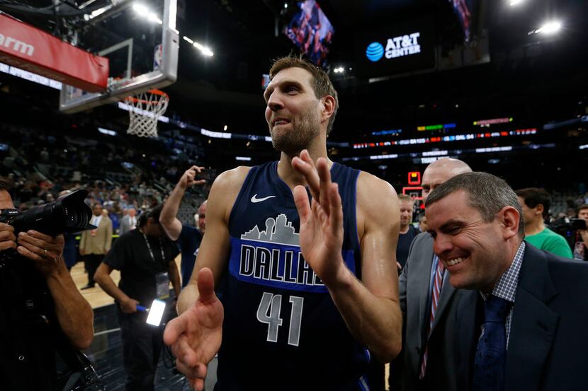 Dallas Mavericks forward Dirk Nowitzki (41) walks off the court after the game against the...