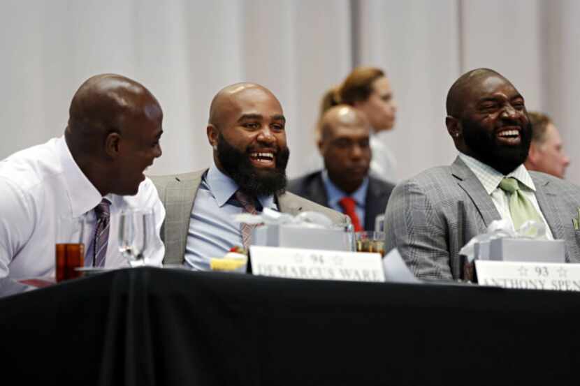 (From left) Dallas Cowboys players DeMarcus Ware, Anthony Spencer and Jay Ratliff laugh...