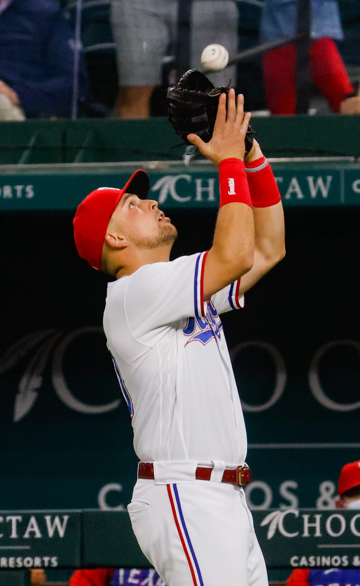 Texas Rangers first baseman Nate Lowe (30) catches Los Angeles Angels Anthony Rendon's ball...