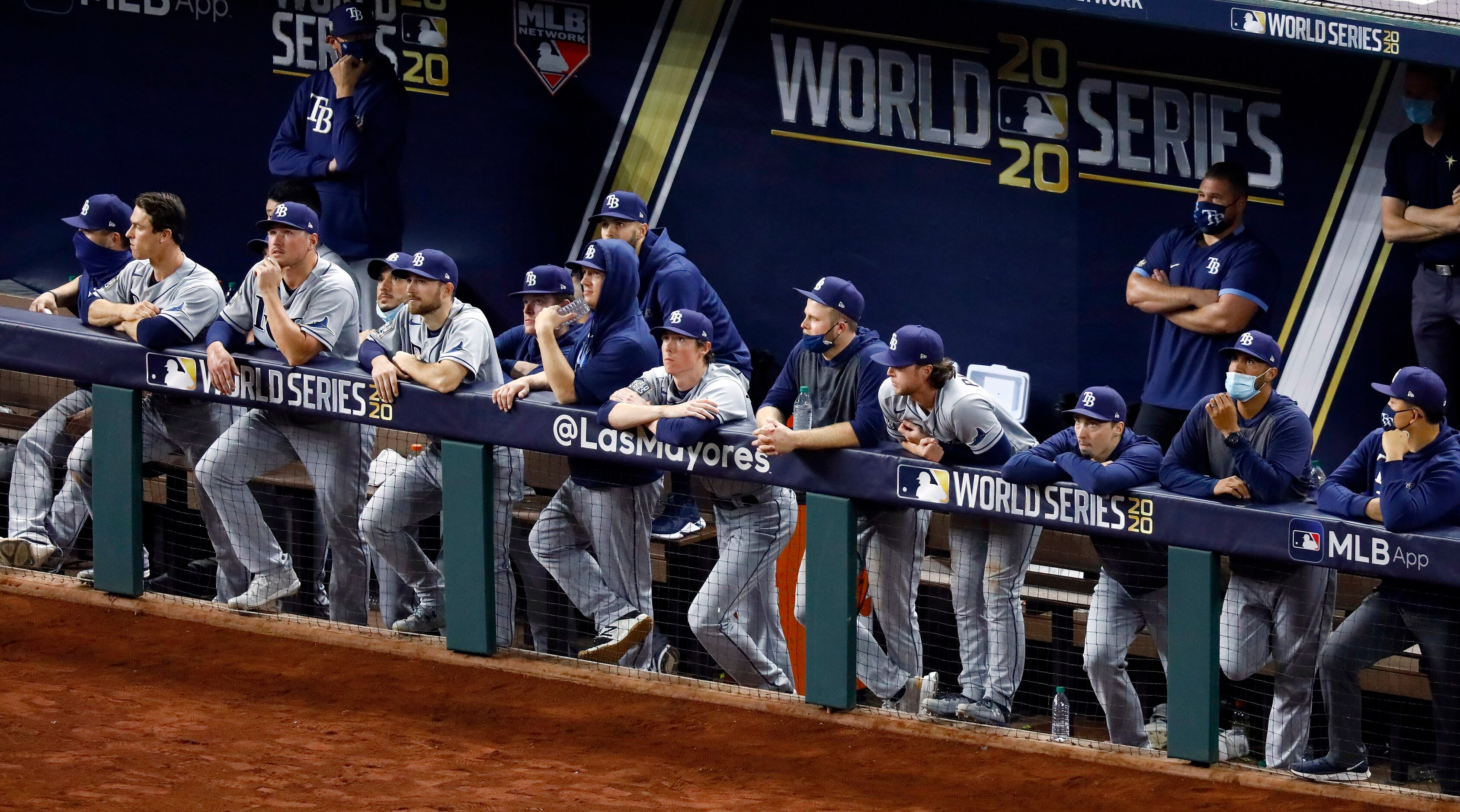 Tampa Bay Rays players watch as they are down to their last out against the Los Angeles...