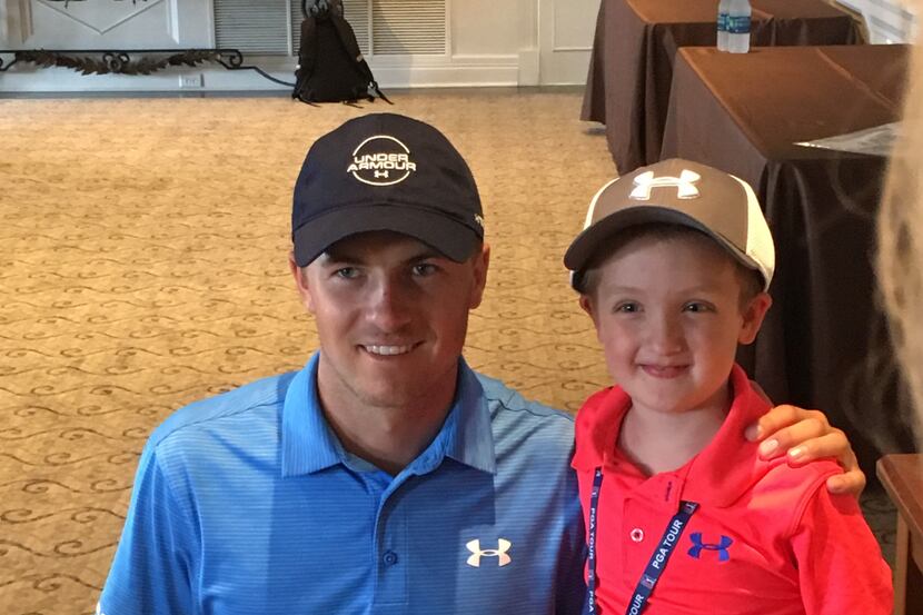 Jordan Spieth with 6-year-old Eliot Walser, one of two local leukemia patients with whom he...