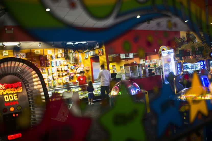A scene of various arcade games and prizes fills the room at Adventure Landing in Dallas,...