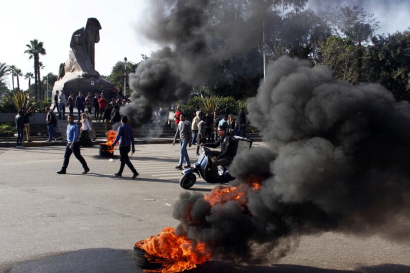 Supporters of ousted leader Mohammed Morsi burned tires during a protest in Nahda Square...