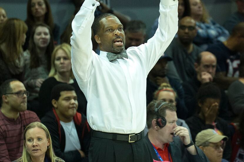 SMU head coach Travis Mays calls a play during the second half of an NCAA college basketball...