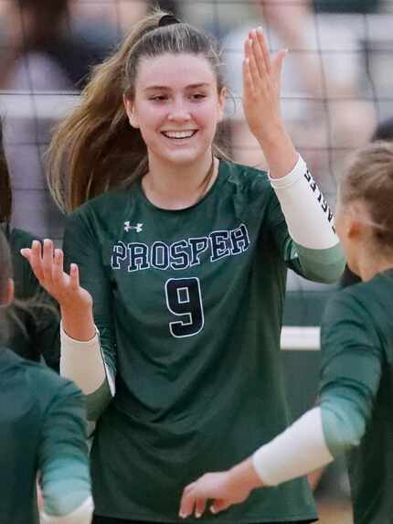 Prosper High School outside hitter Ayden Ames (9) celebrates a point during game two as...