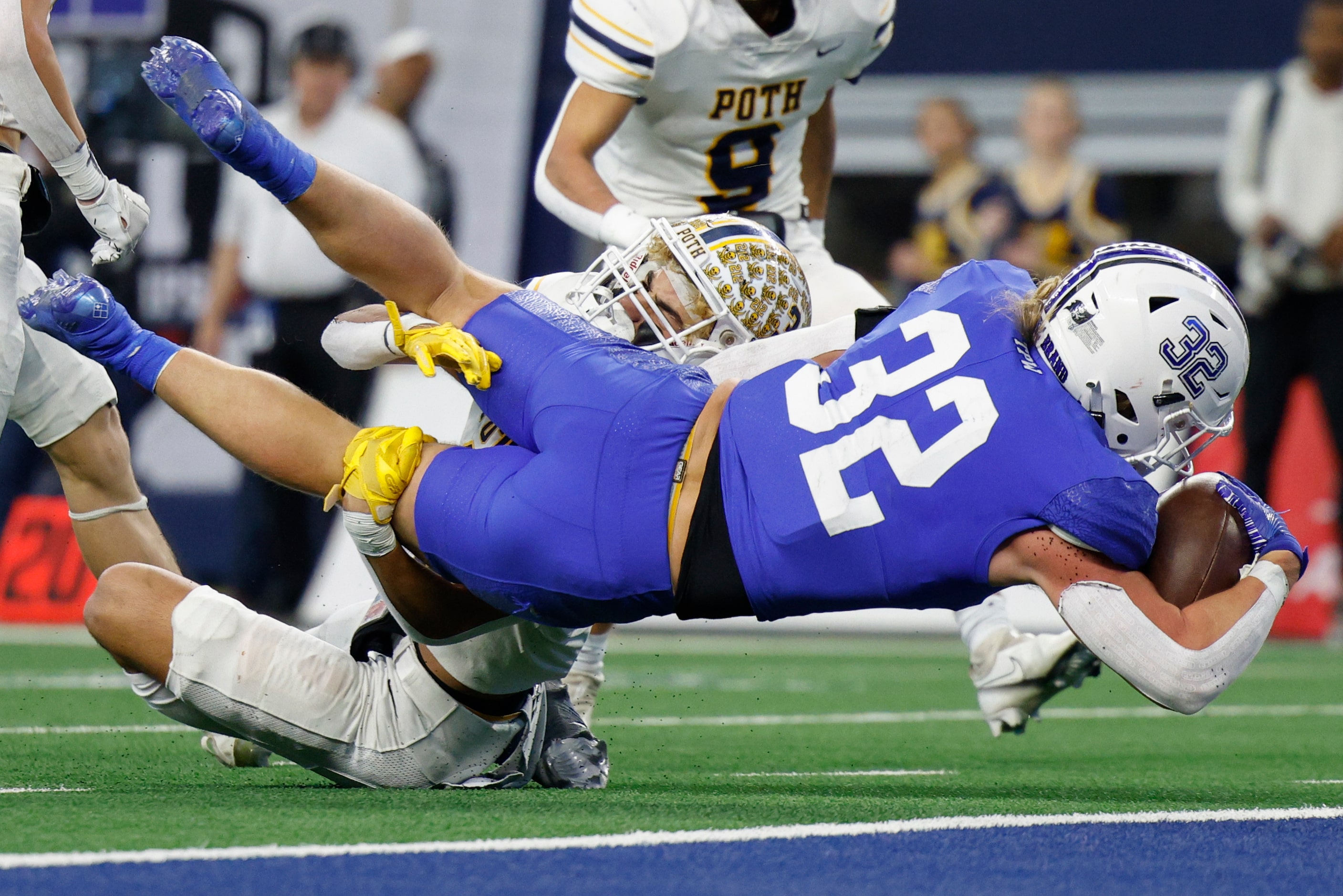 Gunter running back Ashton Bennett (32) runs through a tackle from Poth defensive back...