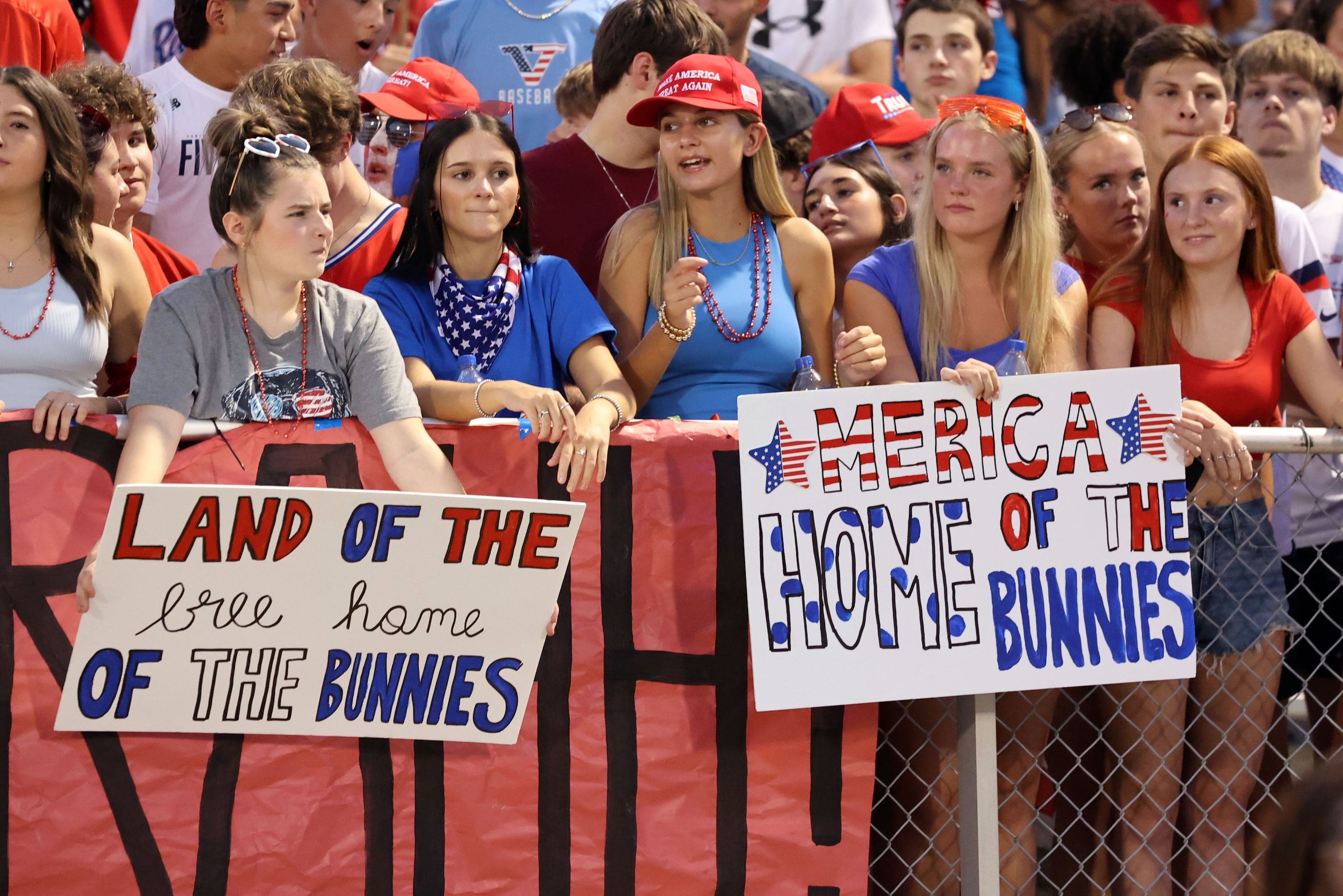 Forney high fans hold ‘Land of the Bunnies” signs (the team mascot is the Jackrabbits)...