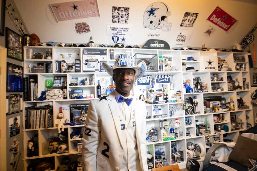 Dallas Cowboys super fan James Wright, aka Suit Man, poses for a photo wearing his all white...