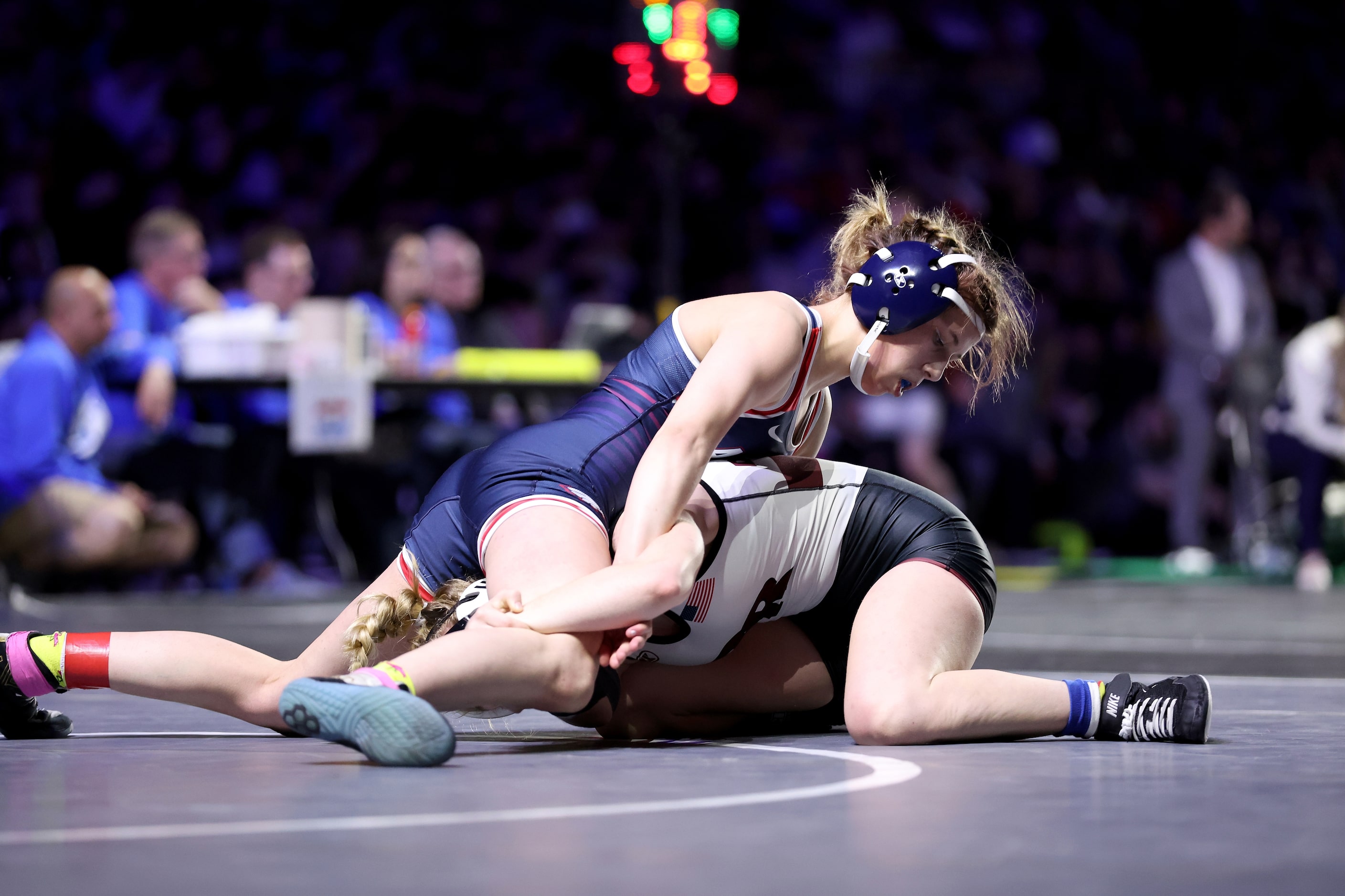 Kailin Sebert of Allen (blue) competes against Brooke McCurley of Round Rock in the Girls 6A...