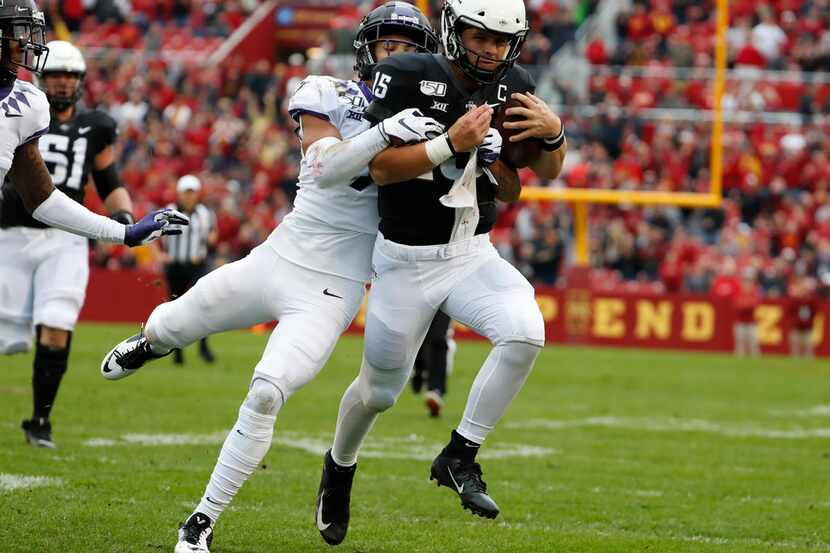 AMES, IA - OCTOBER 5: Safety Trevon Moehrig #7 of the TCU Horned Frogs tackles quarterback...