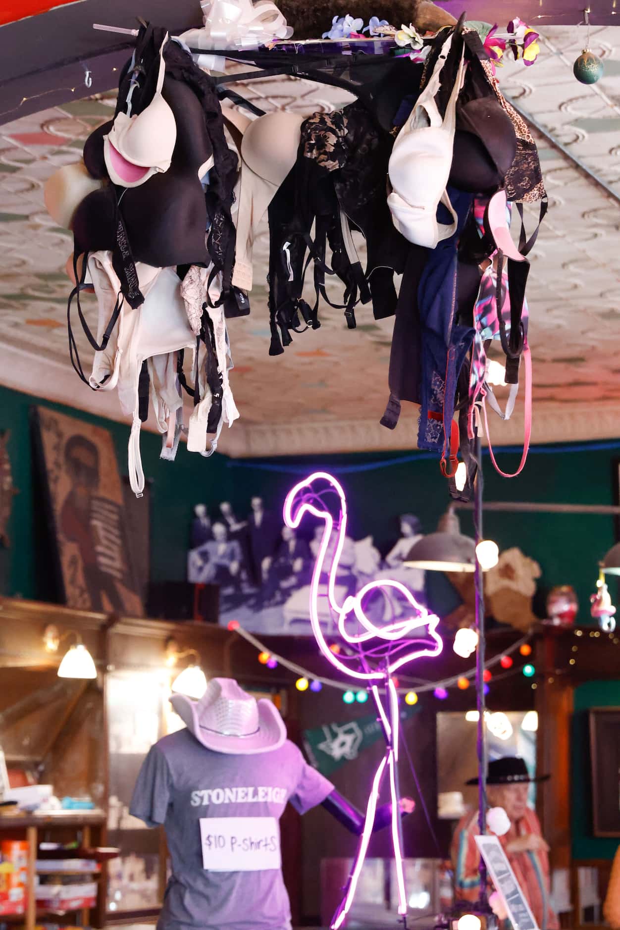 Owner Tom Garrison says he hates the bras hanging from the ceiling at the Stoneleigh P....