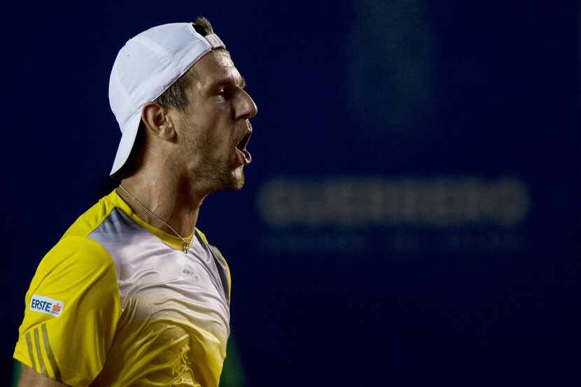Jurgen Melzer of Austria reacts during the game of Mexican Tennis Open against Joao Sousa of...