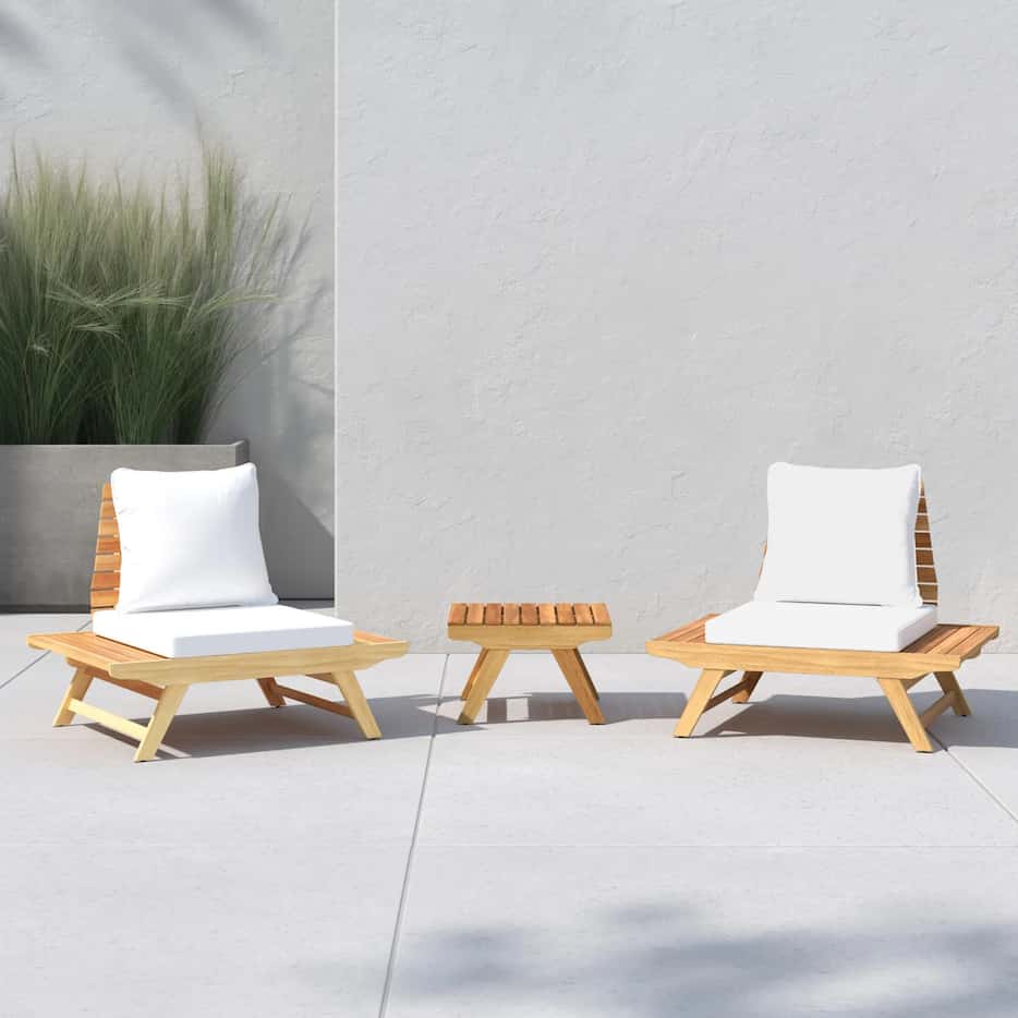 Outdoor space with modern wooden patio chairs with white cushions