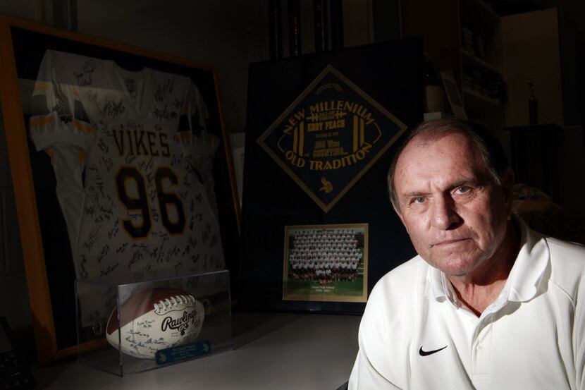 Portrait of Eddy Peach, the football coach at Arlington Lamar High School since 1970,...
