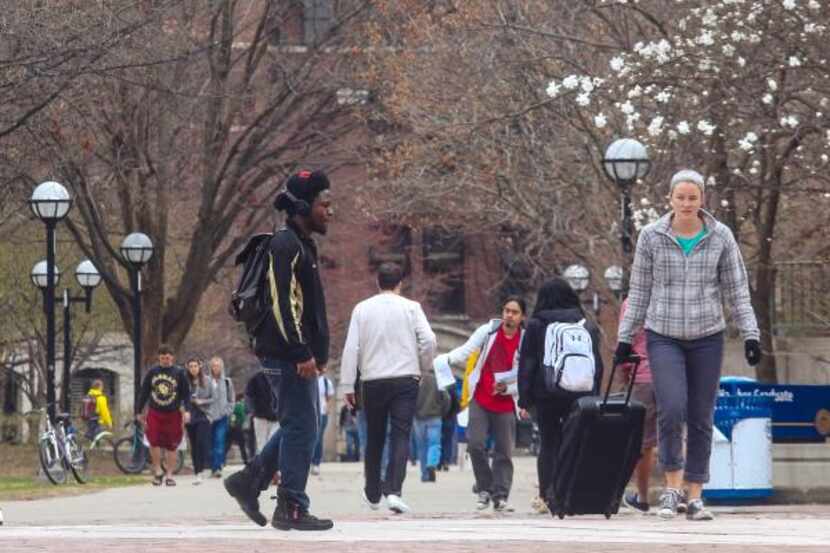 
Students head for classes at the University of Michigan. The Supreme Court ruled Tuesday...