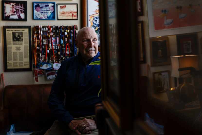 Local sports radio legend Norm Hitzges looks outside a window while posing for a portrait at...