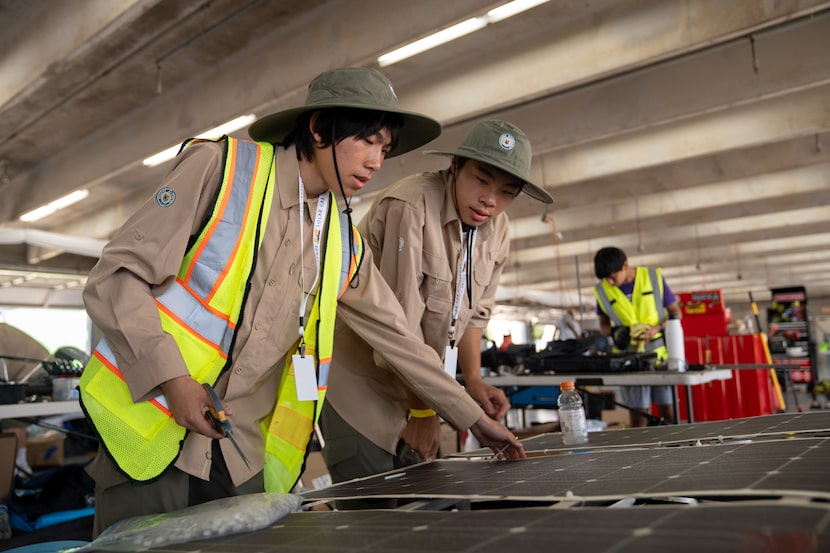 Pacific Academy students from Irvine, California, prepare their solar-powered vehicles for a...