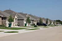 New houses are seen in Eastland new home community, Tuesday, May 14, 2024, in Crandall....