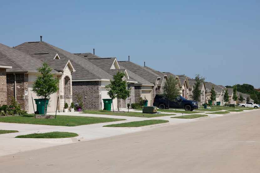 New houses are seen in Eastland new home community, Tuesday, May 14, 2024, in Crandall....