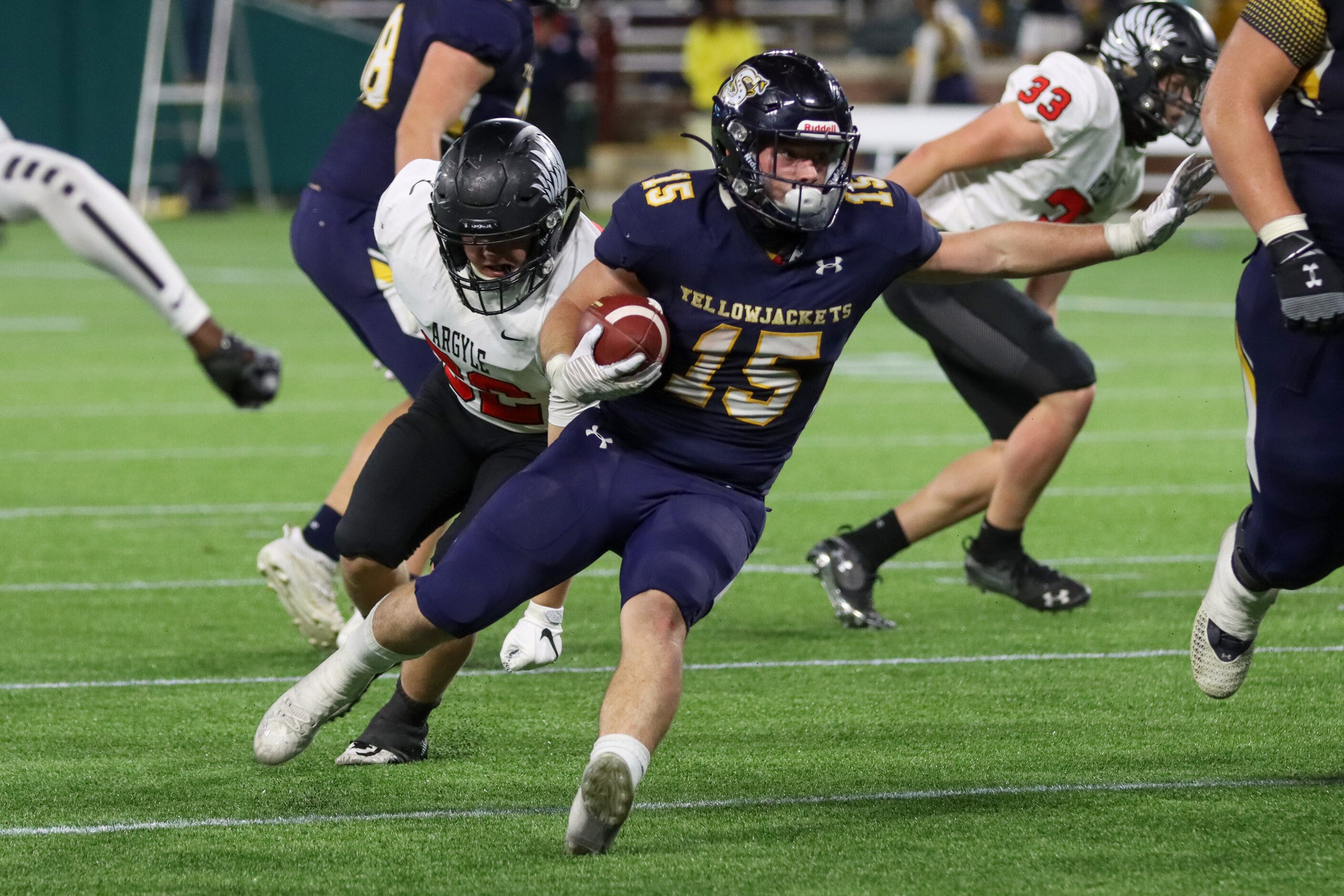 Stephenville running back Kason Philips (15) breaks away from Argyle linebacker Landon...