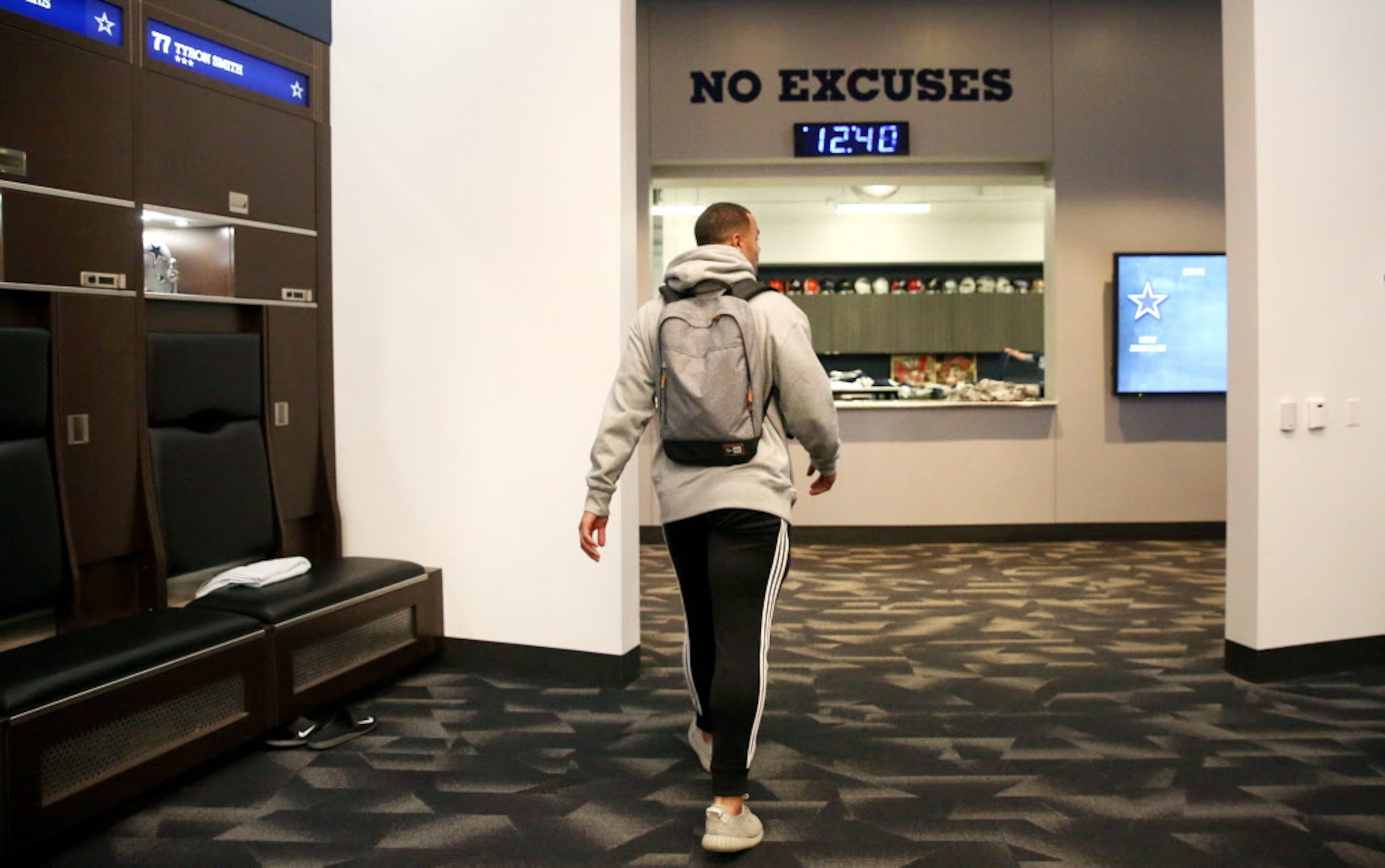 Dallas Cowboys quarterback Dak Prescott leaves the locker room during locker room clean out...