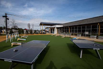 Most of the outdoor area is turfed and filled with bar games like cornhole and pingpong.