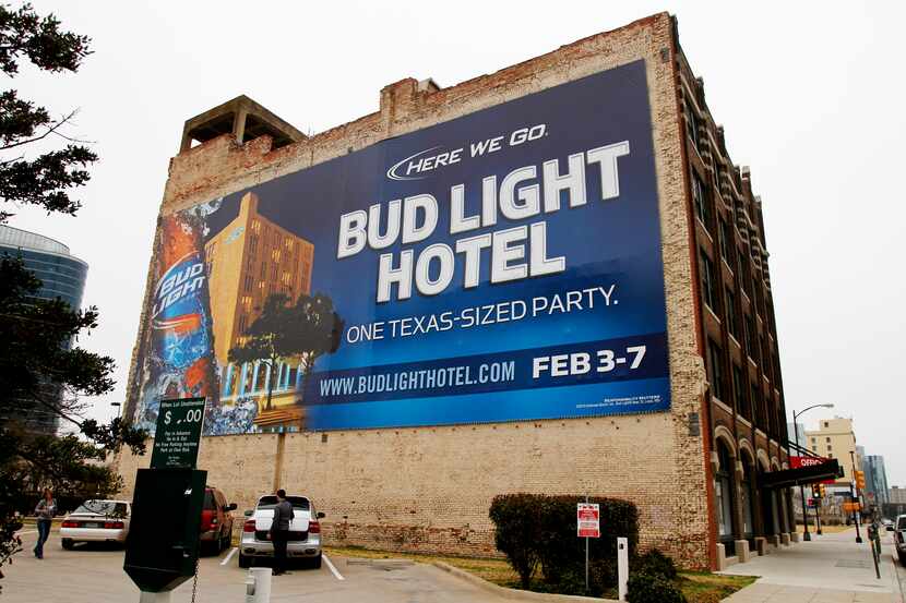 An ad for the Bud Light Hotel, 20 days after Super Bowl XLV on a building on Jackson Street...