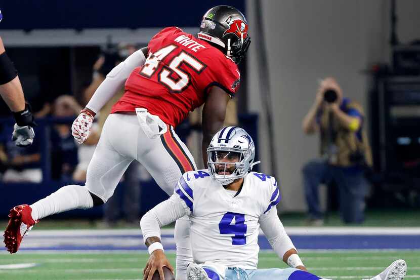 Dallas Cowboys quarterback Dak Prescott (4) reacts after being sacked by Tampa Bay...
