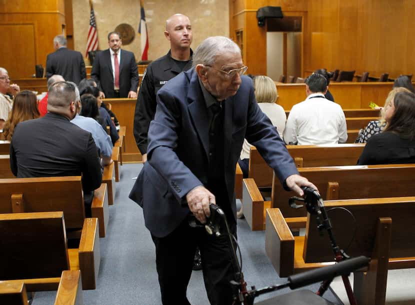 John Feit exits the the 92nd State District Court during a break for lunch in his trial for...