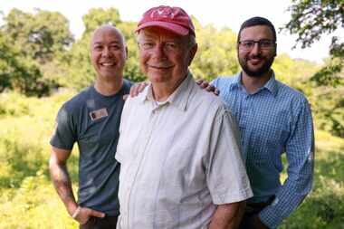 Chris Corpus (left), director of conservation at the Dallas Zoo, George Archibald (center),...