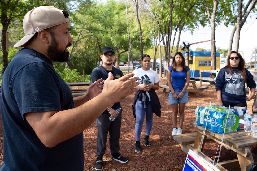 Executive Director of Somos Tejas, Ramiro Luna, organizes a block walk in Oak Cliff at Tyler...