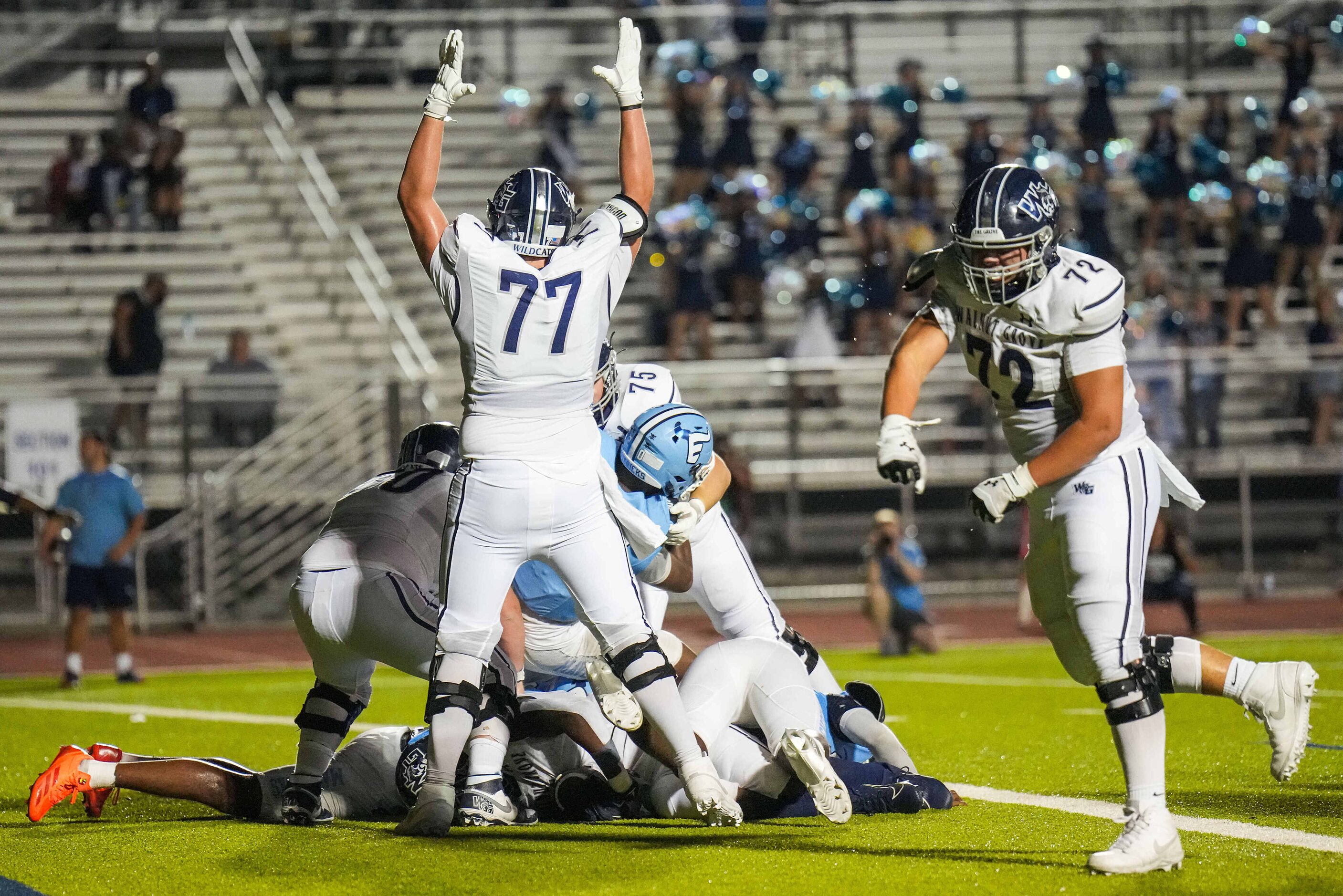 Prosper Walnut Grove offensive lineman Nathan Hema (72) and offensive lineman Lucas Hickey...