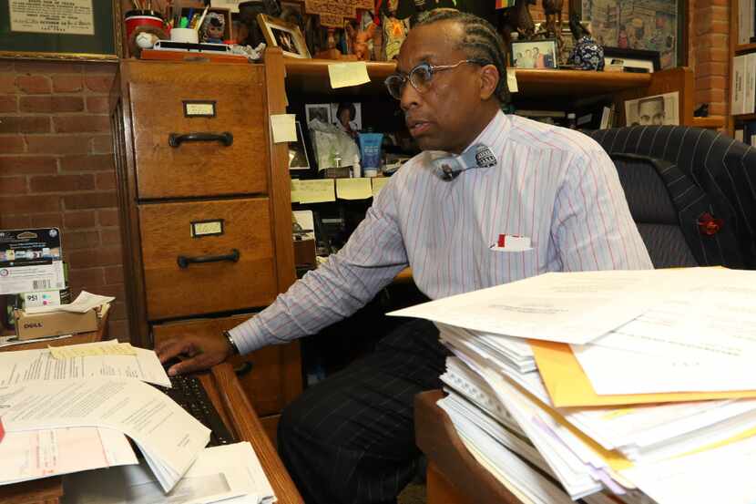 Dallas County Commissioner John Wiley Price worked in his Dallas office on April 29.