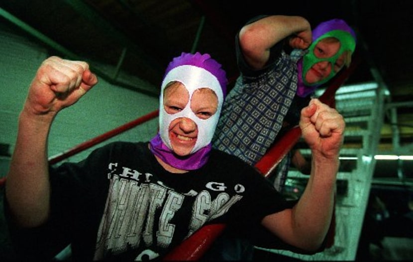 Oak Cliff wrestling fans John "Smokey" Buford and his  friend Willie "Tag" Page, both 13,...