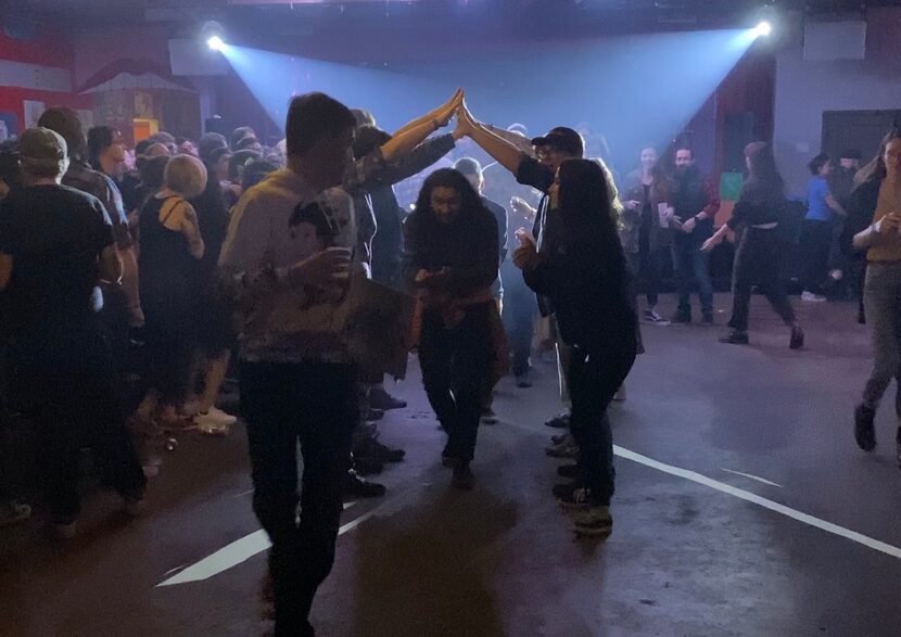 Members of the crowd follow Dan Deacon's directions during his concert at Deep Ellum Art Co....