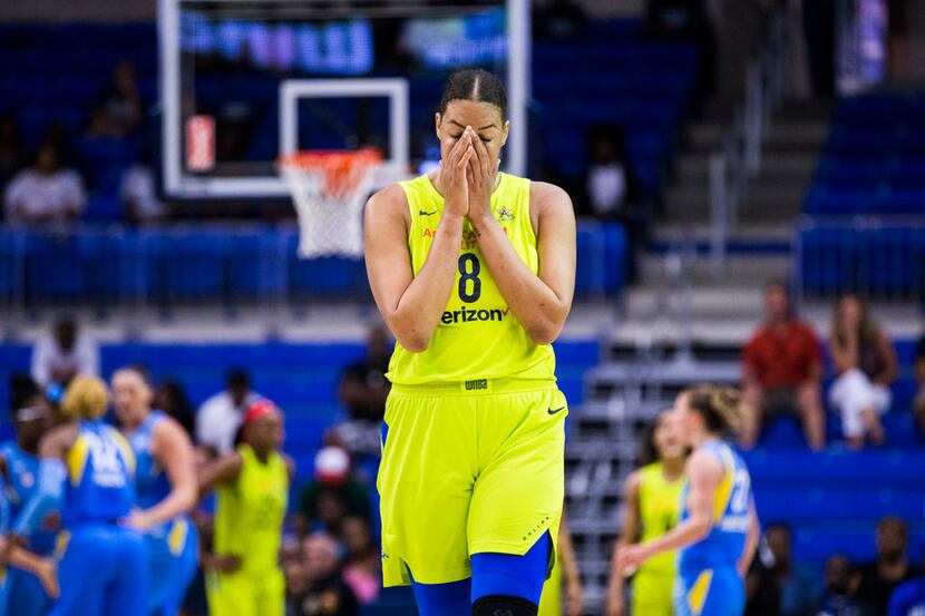 Dallas Wings center Liz Cambage (8) reacts after a play during the fourth quarter of a WNBA...