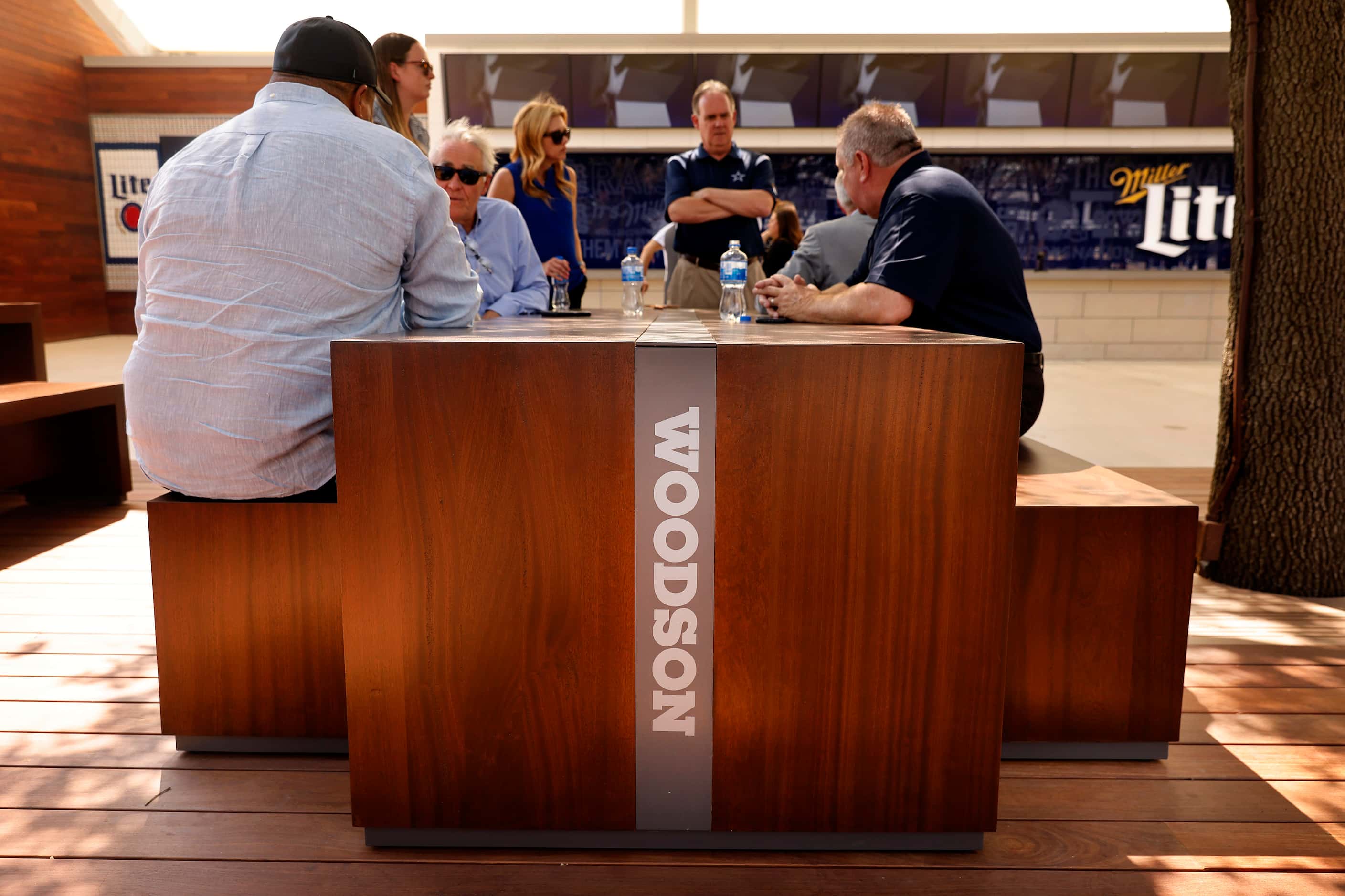 Wood tables are named for the Dallas Cowboys Ring of Honor members, including Darren...