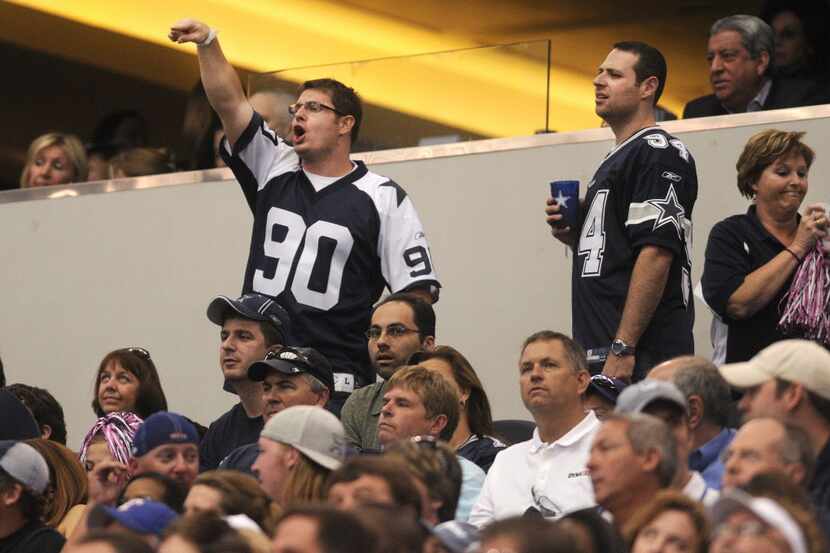 Disappointed Dallas Cowboy fans boo players after their poor performance during second half...