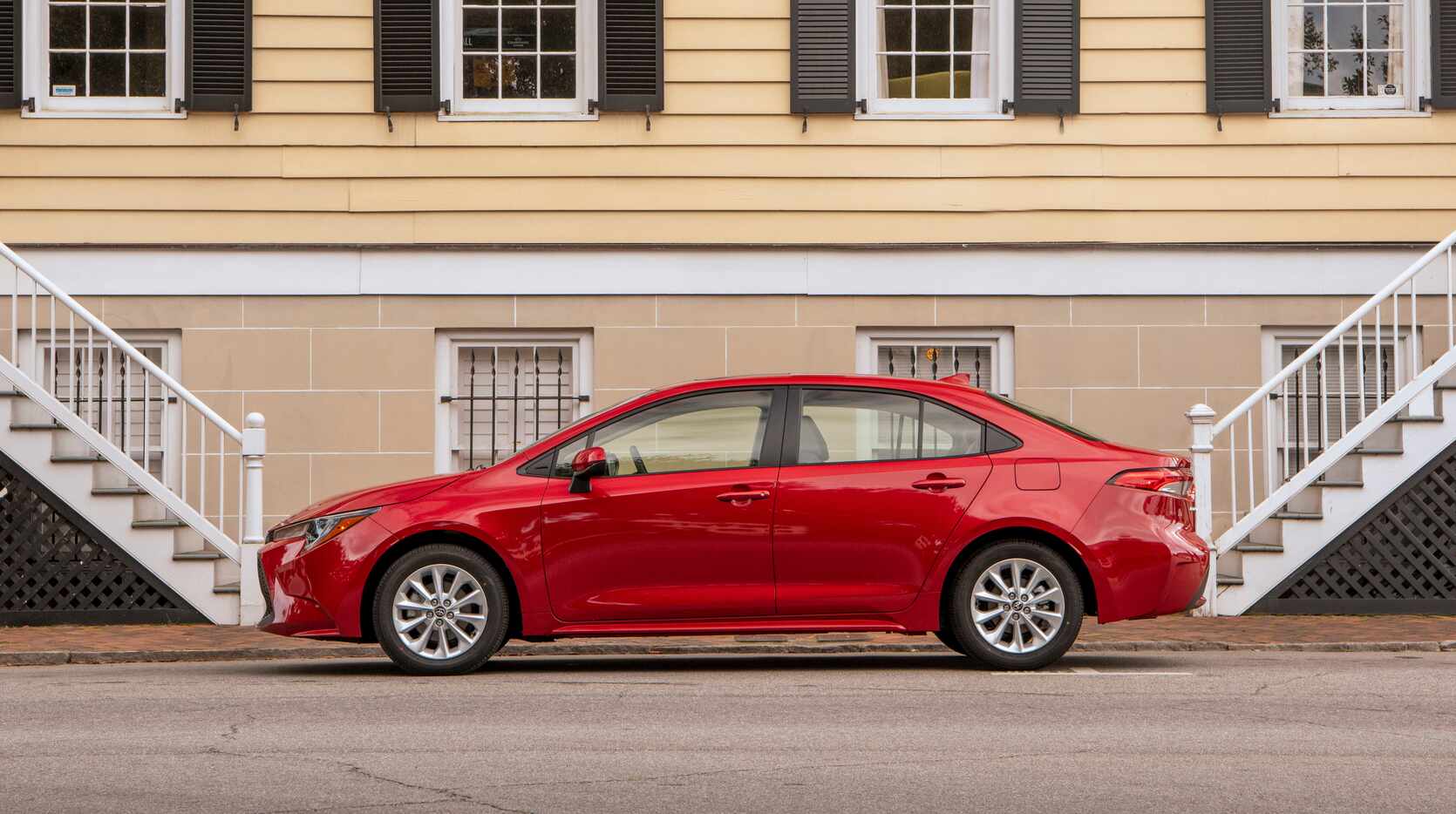 The 2020 Toyota Corolla LE in metallic Barcelona red.