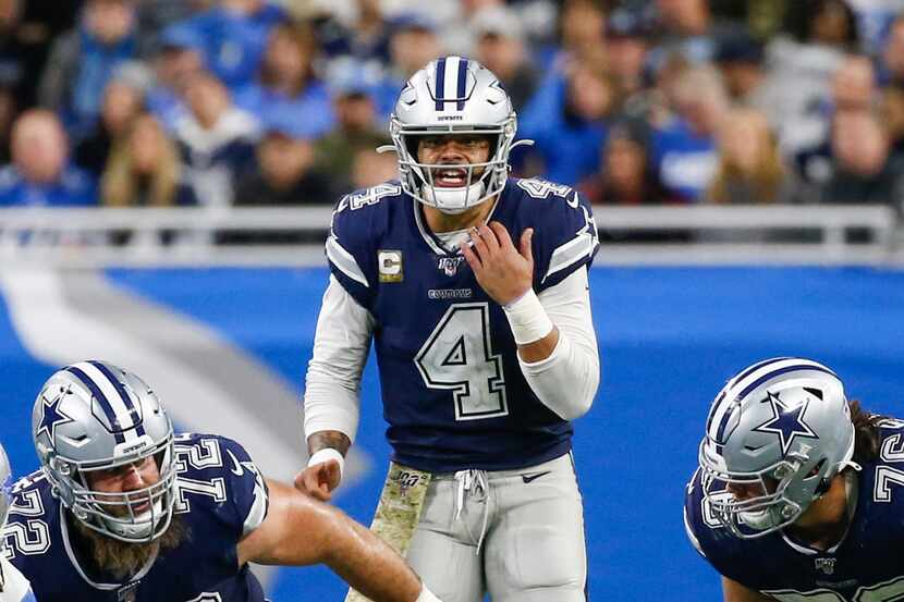 FILE - Cowboys quarterback Dak Prescott (4) calls a play during the second half of a game...