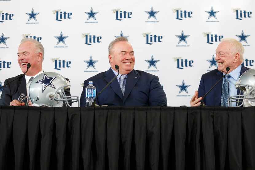 Dallas Cowboys new head coach Mike McCarthy (center) shares a laugh with Dallas Cowboys...
