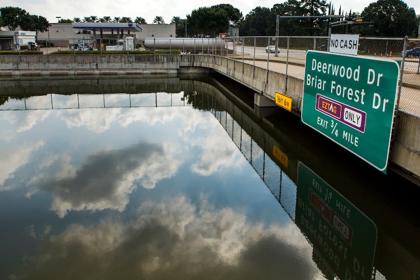 A fuel truck uses the service road as nearly 16 feet of Hurricane Harvey floodwater still...